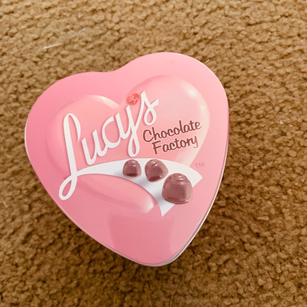 Avon 2005 Lucy’s chocolate factory analog watch in heart tin $10.00